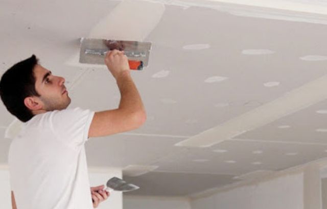 how to remove water stains from popcorn ceiling