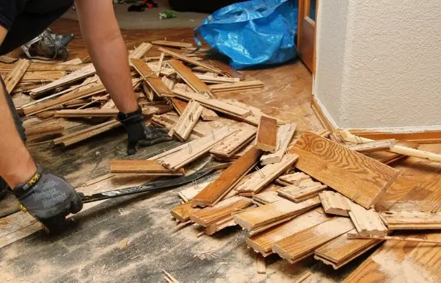 how to remove glued down wood flooring