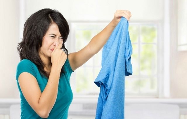 how to get rid of urine smell in clothes