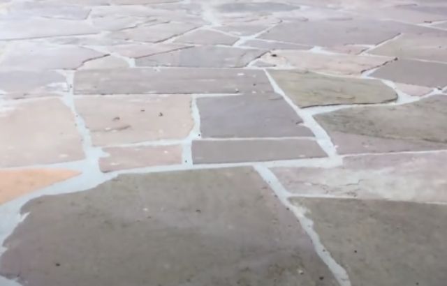 laying flagstone in sand