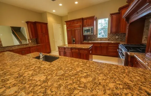 how to remove oil stains from granite countertops