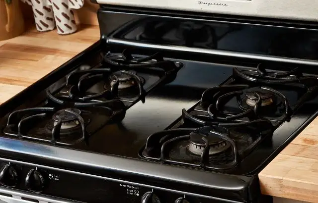 how to clean a black stove top