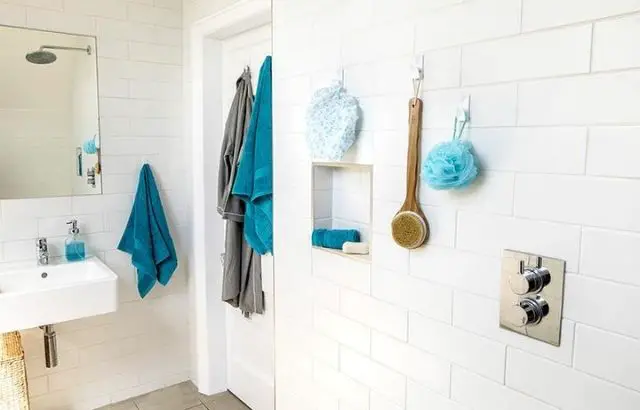 how to hang things on tiles