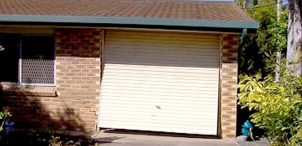 Possible Causes of Your Garage Door Hitting the Floor and Then Rising