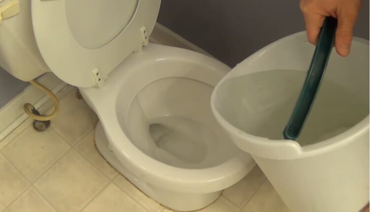 How to Flush a Toilet with a Bucket of Water
