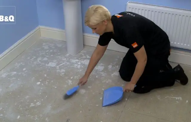 How to Lay Vinyl Tiles in a Bathroom Wall