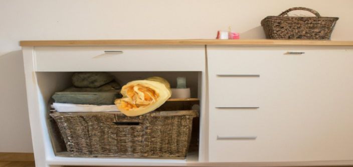 Add a cabinet for towels and other items.
