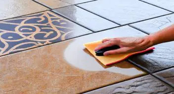 Apply the cleaning solution onto a rough stone tile surface