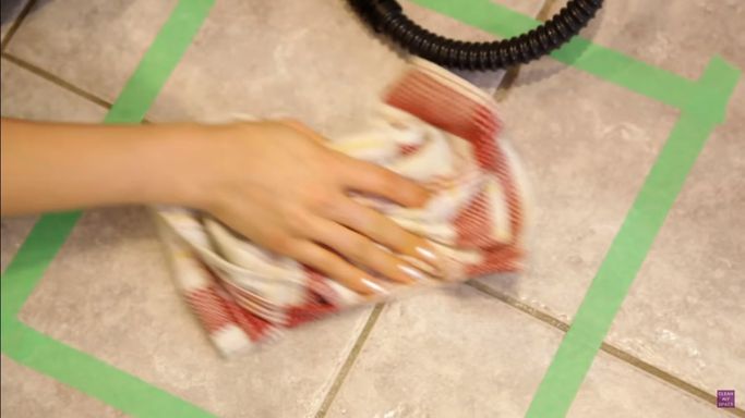 Clean the grout with a microfiber cloth