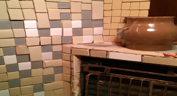 Lay the tile(s) and grout.