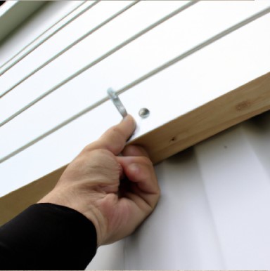 Attach the material to the siding 