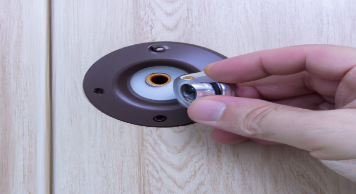 Install a peephole in your door.