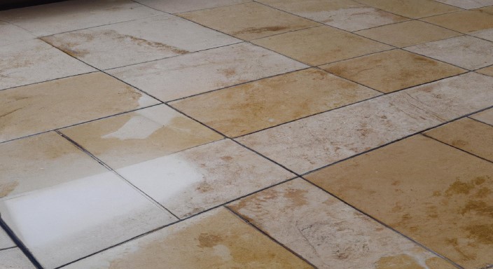 Apply the cleaning solution to the Travertine shower