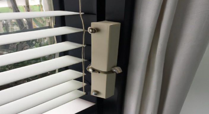 Use a twist or lock mechanism to secure the blinds in the desired position 