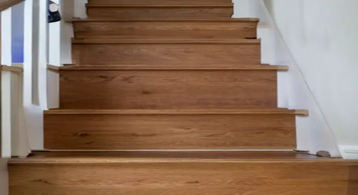 14. Secure the laminate flooring to the stairs 
