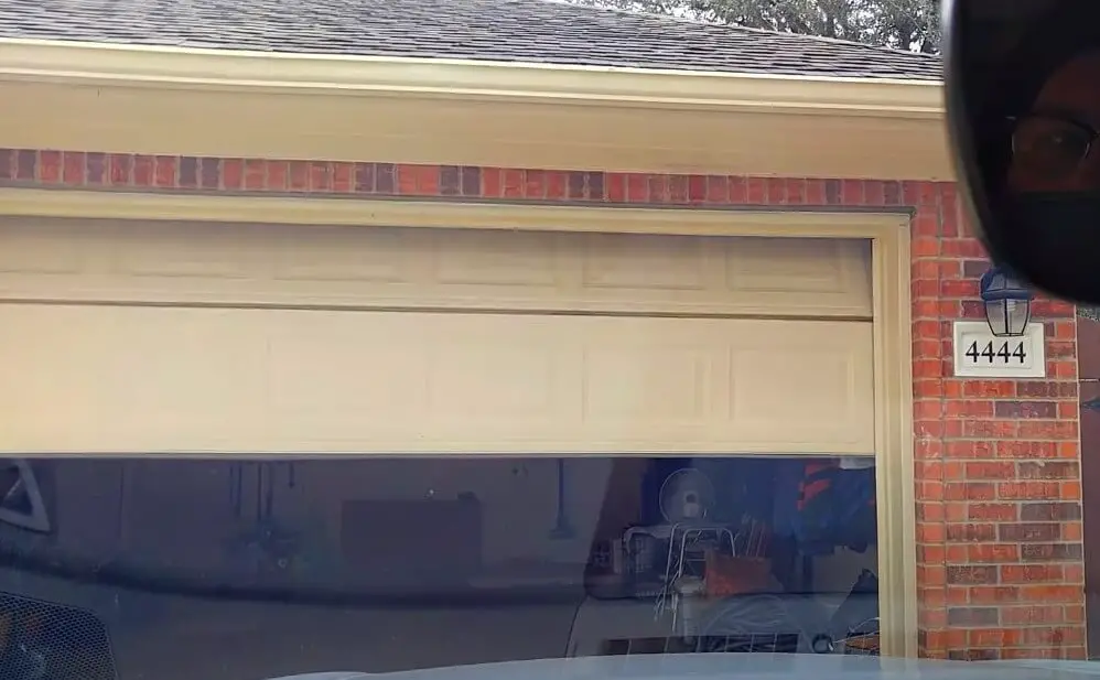 Observe if the garage door opens/closes, indicating successful programming.