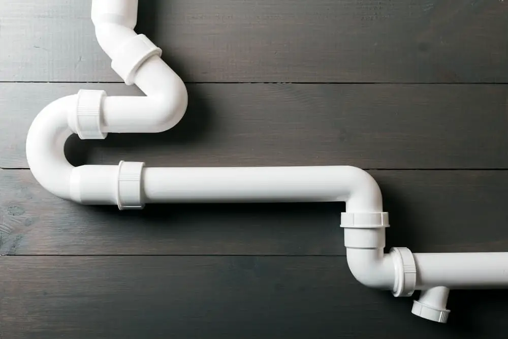Connect a 2-inch PVC pipe to the toilet's vent connection.