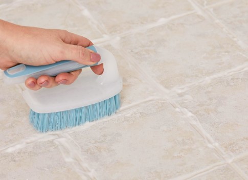 Scrubbing: Use a soft-bristle brush to scrub the area gently.
