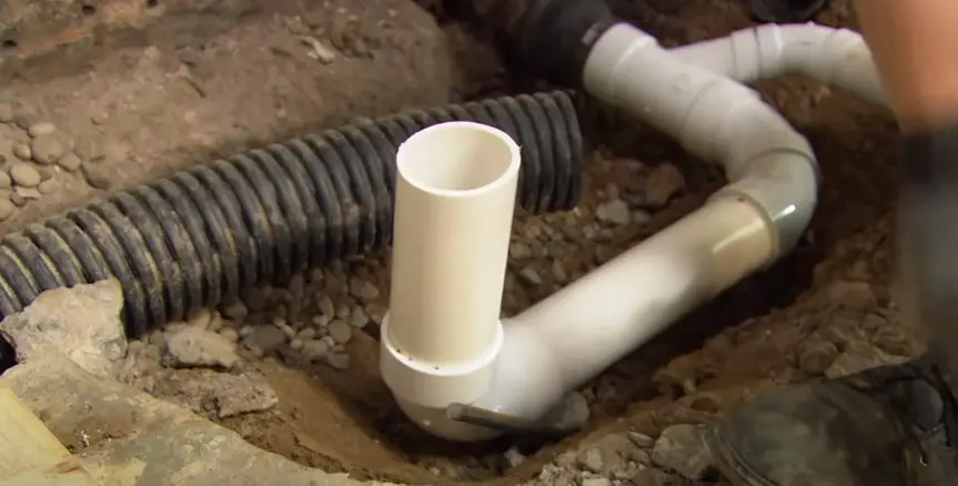 Connect the PVC pipe to the main vent stack using a tee or wye fitting.