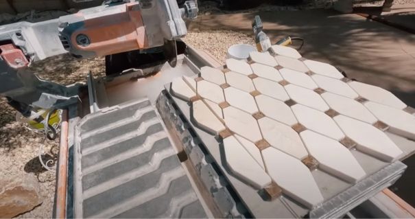 Tile Saw Setup: For straight cuts, set up a wet tile saw with a fine-toothed diamond blade.