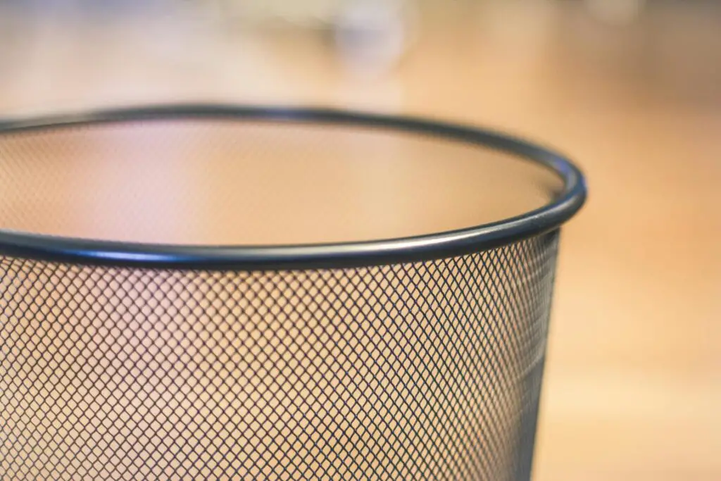 how to hide trash cans in kitchen