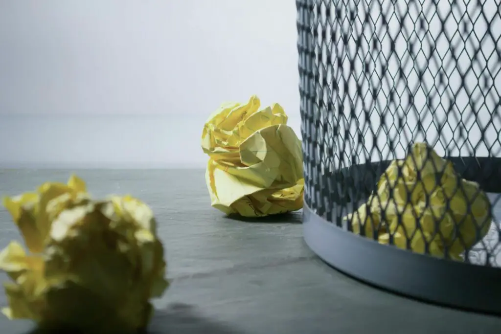 how to hide trash cans in kitchen