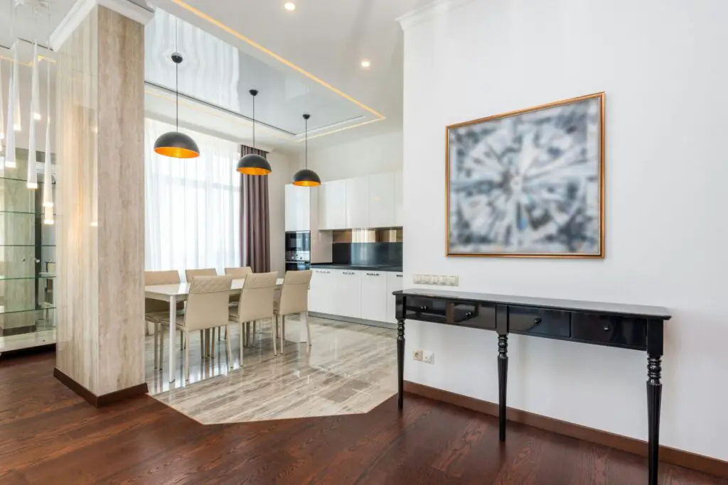 Stylish modern dining room featuring contemporary furniture and elegant lighting.